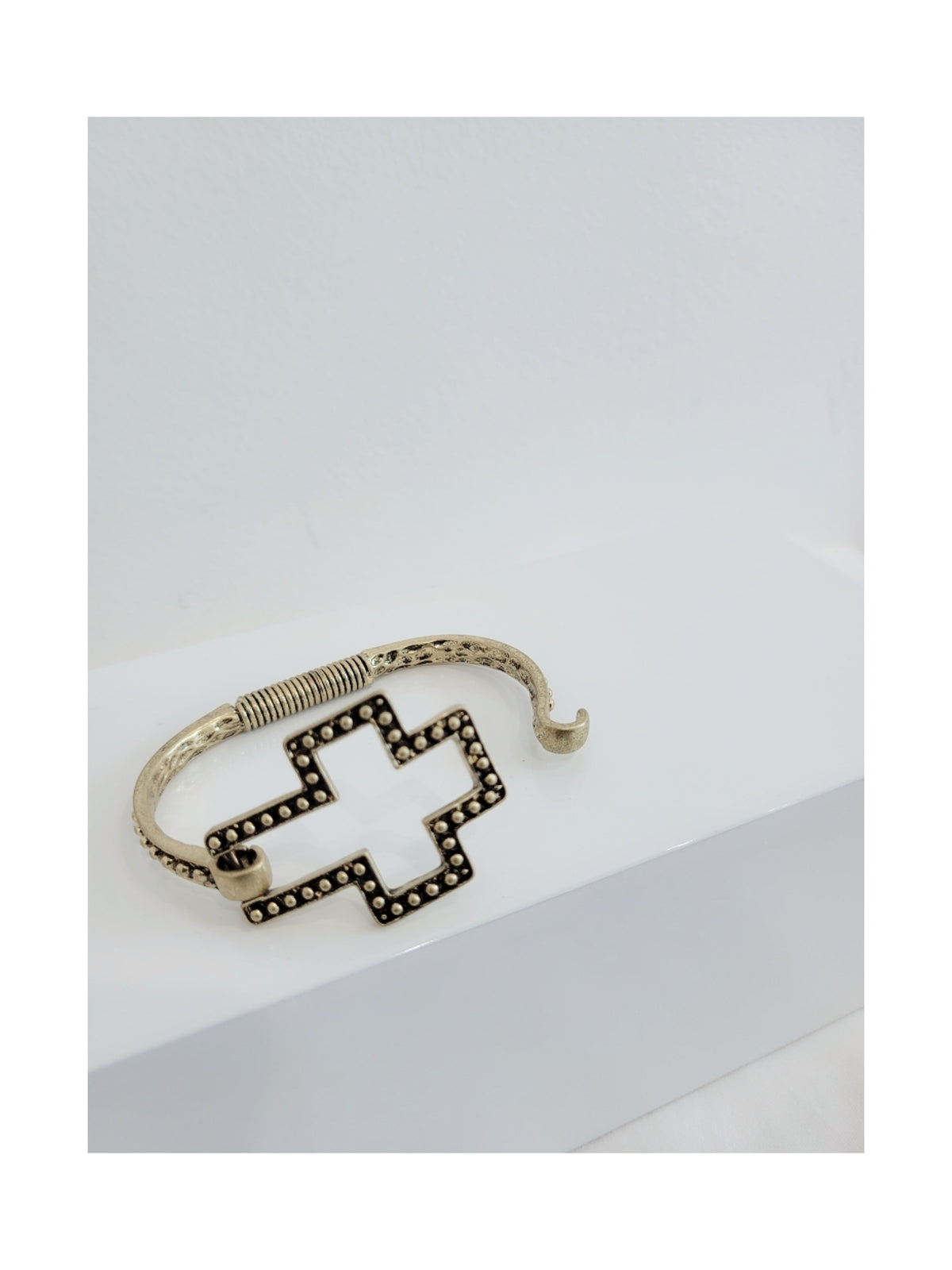 Cross bracelet (stained gold)